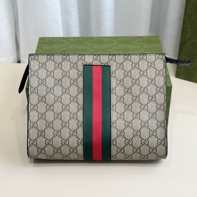 G*u*i clutch bags